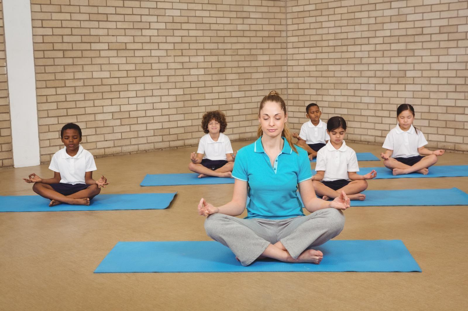 How Mindfulness Helps Kids Stay Calm, Focused, and Emotionally Healthy 23 philly kids doing yoga