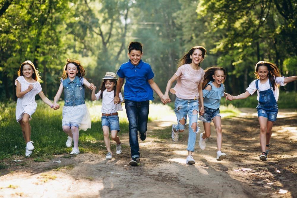 Outdoor Fitness Games for Kids That Actually Tire Them Out 2 Kids playing outdoor game Sharks and Minnows for fun