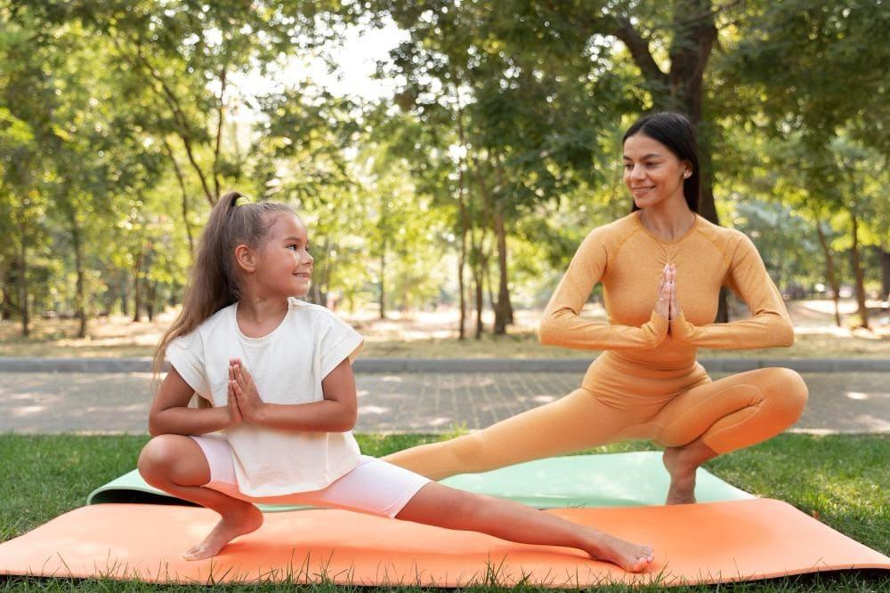 Mother teaching and doing mindfulness for kids benefits